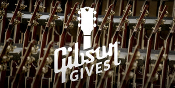 Banner Image For Strumming With The Stars: rare guitars signed by music icons go under the hammer