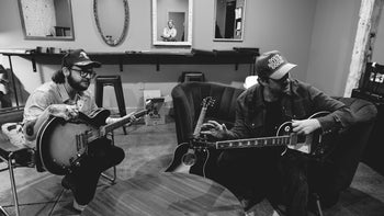 Grayscale on the Gibson guitars that drive their sound