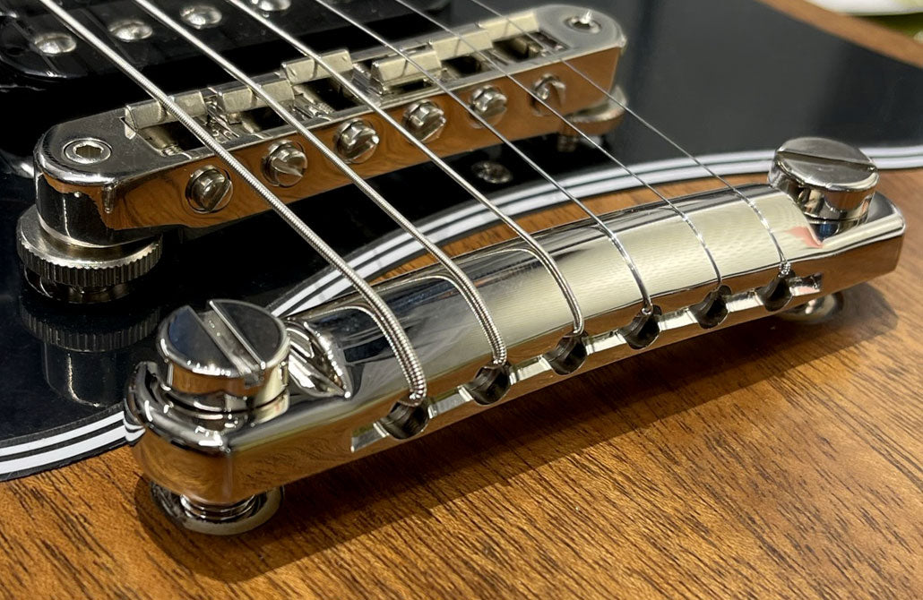 Banner Image For What is top-wrapping and should you do it on your Gibson guitar?
