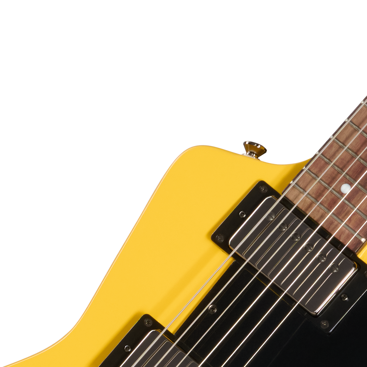 Close-up of a yellow electric guitar on a white background