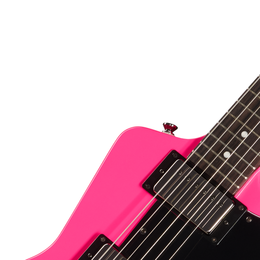 Close-up of a pink electric guitar on a white background