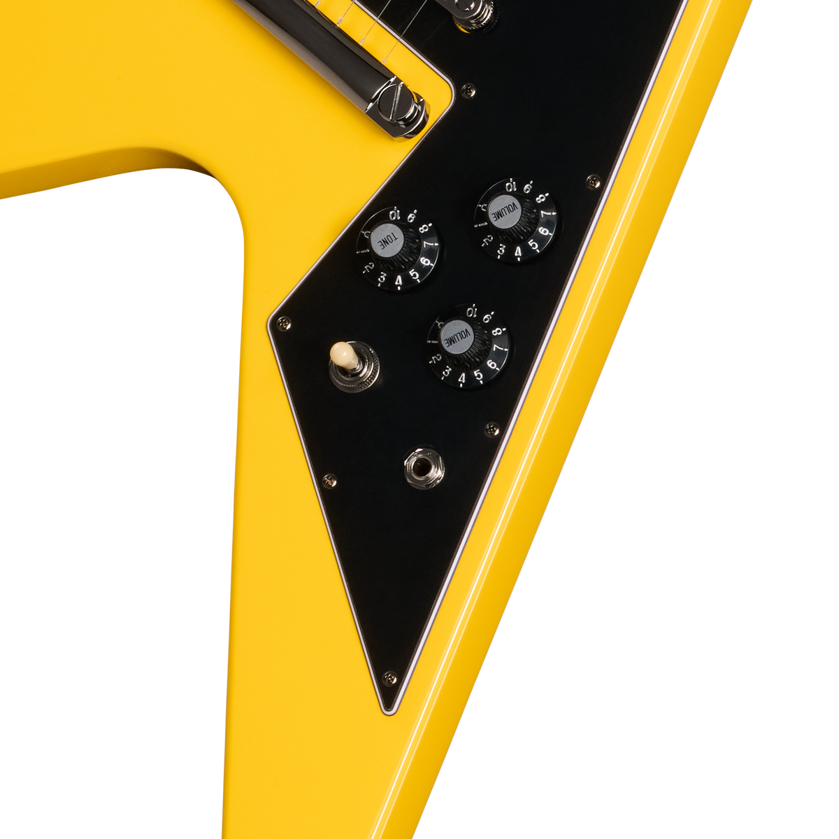 Close-up of a yellow electric guitar with a black pickguard on a white background