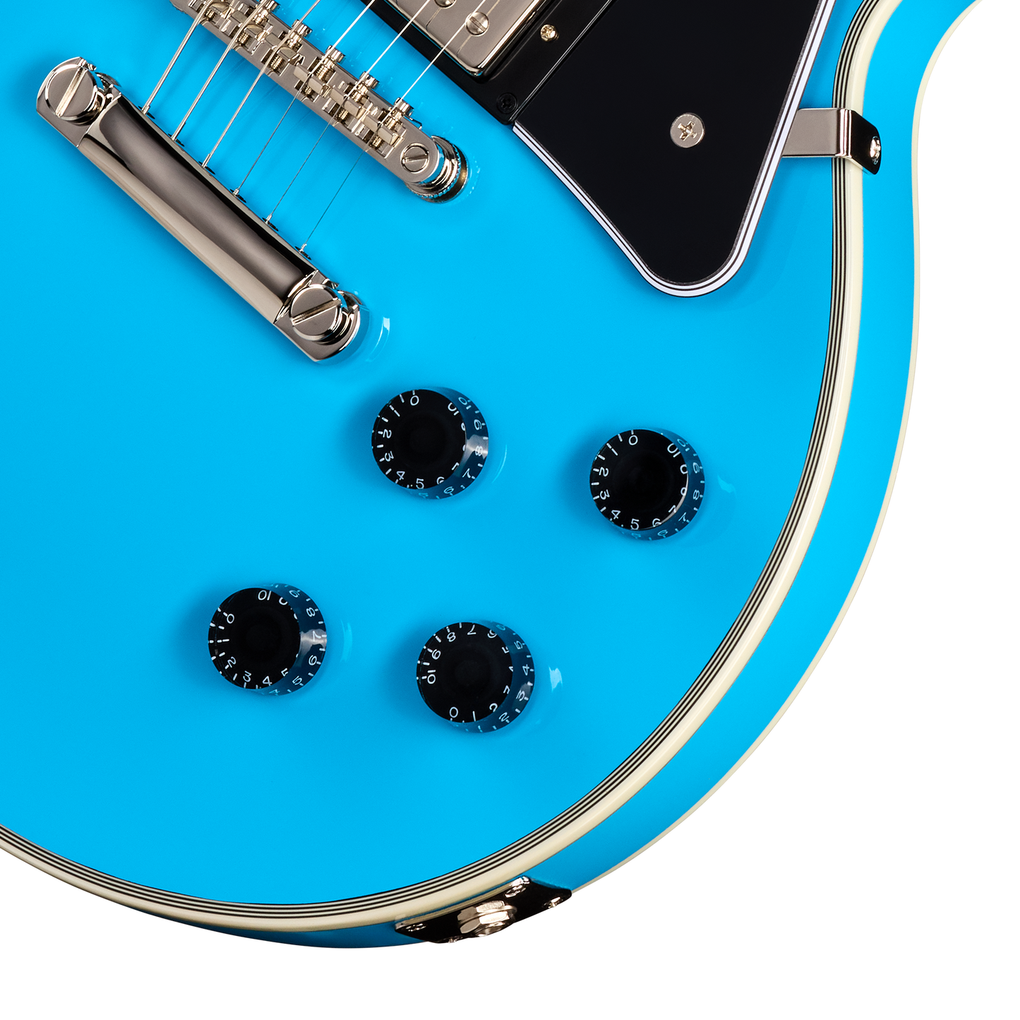 Close-up of a blue electric guitar with a focus on the body and neck.