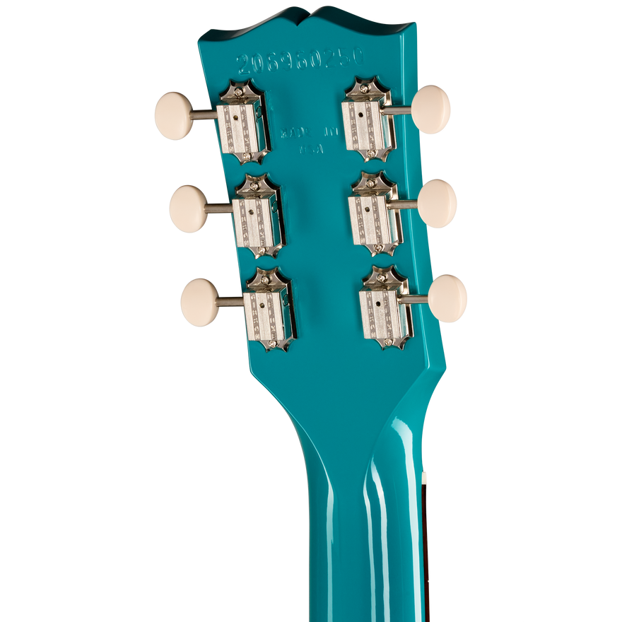 Close-up of a teal guitar headstock with tuning pegs on a white background