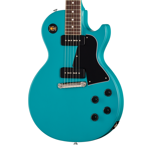 Turquoise electric guitar on a white background