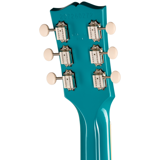 Close-up of a teal guitar headstock with tuning pegs on a white background