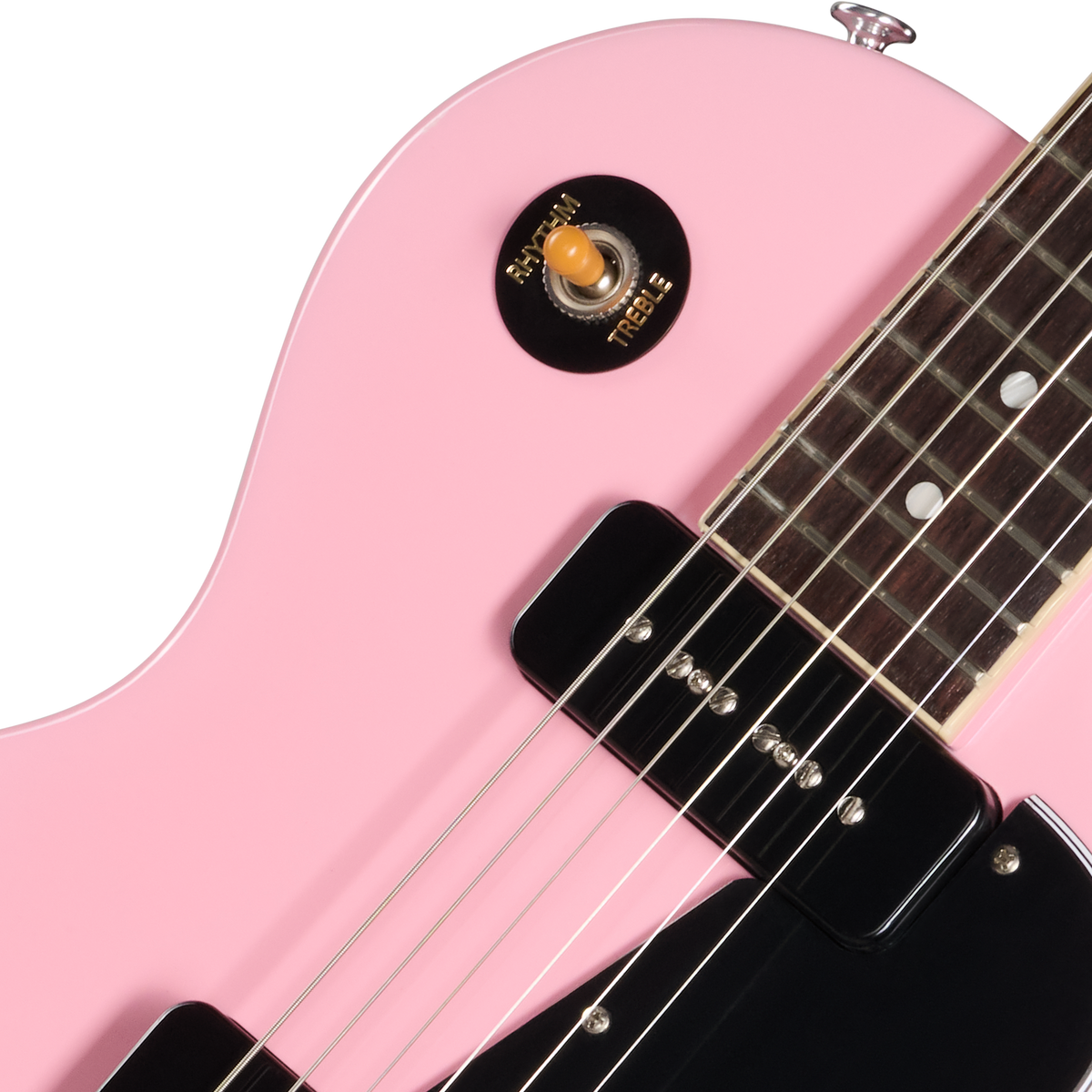 Close-up of a pink electric guitar with a white background