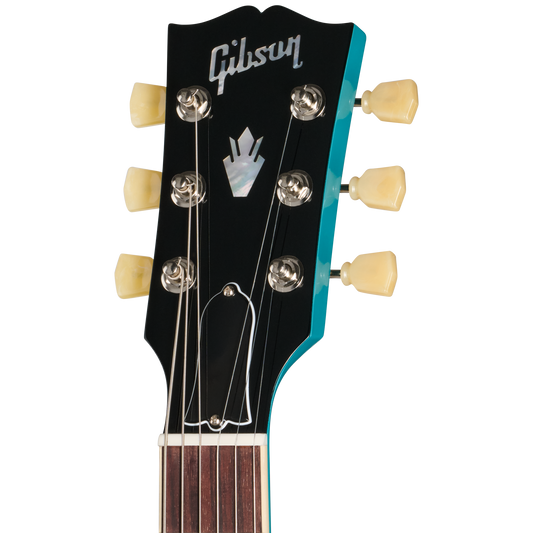 Gibson guitar headstock with brand logo on a white background
