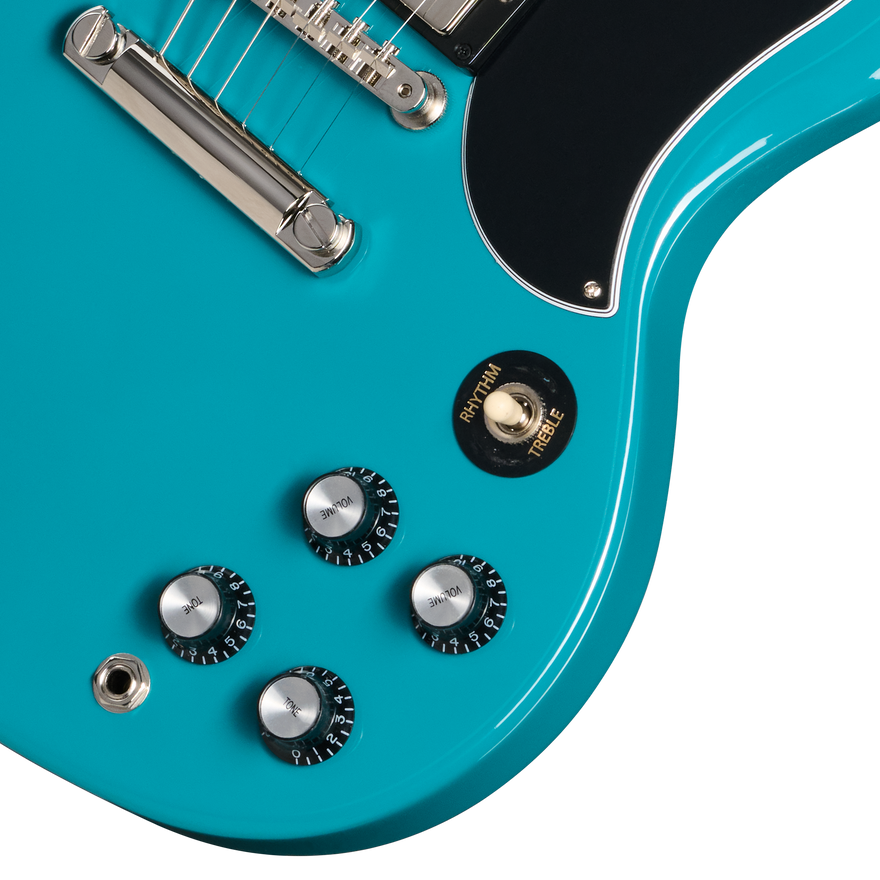 Close-up of a turquoise electric guitar with control knobs and tuning pegs on a white background