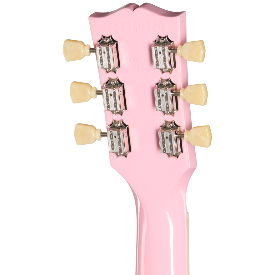Close-up of a pink guitar headstock with tuning pegs on a white background