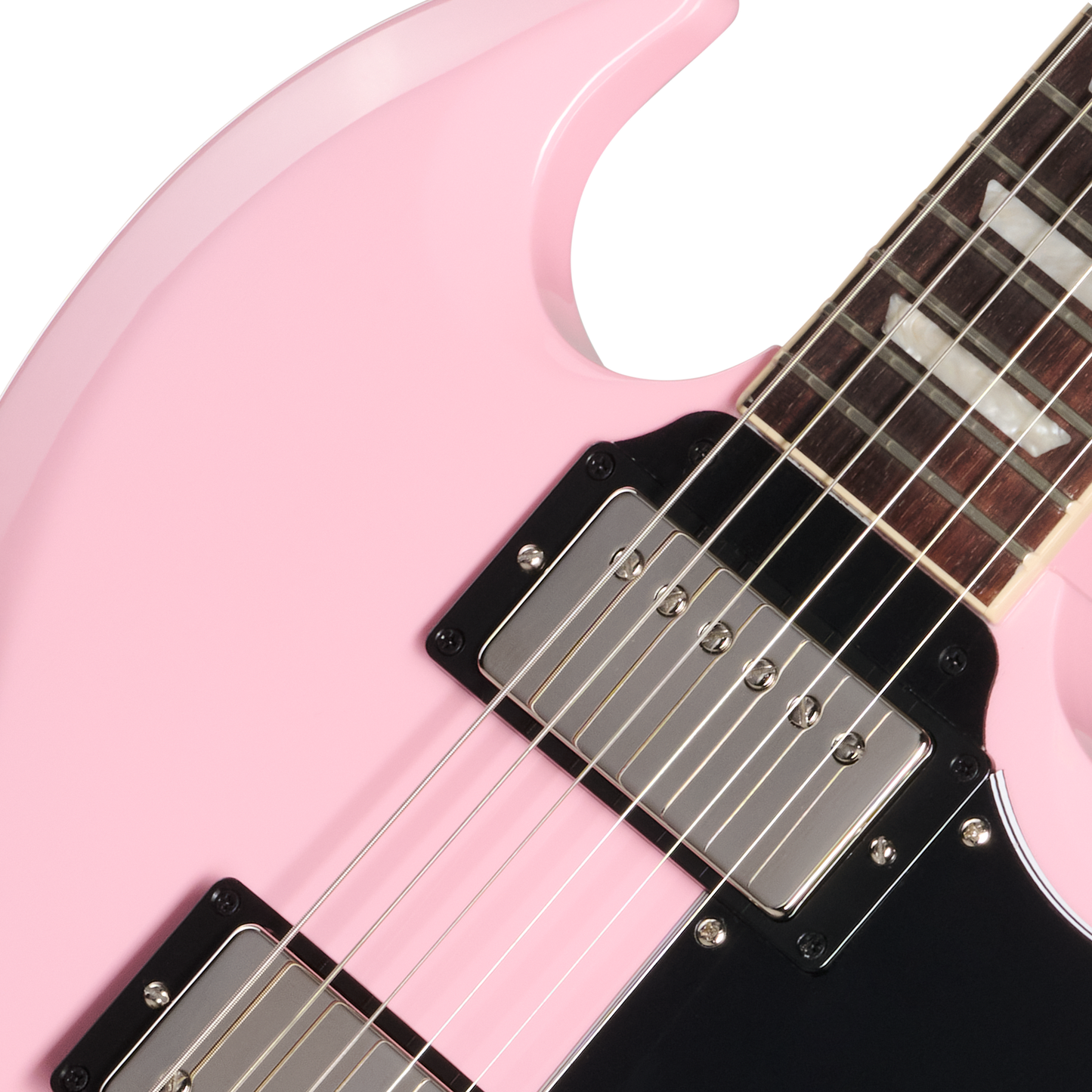 Close-up of a pink electric guitar with a white pickguard